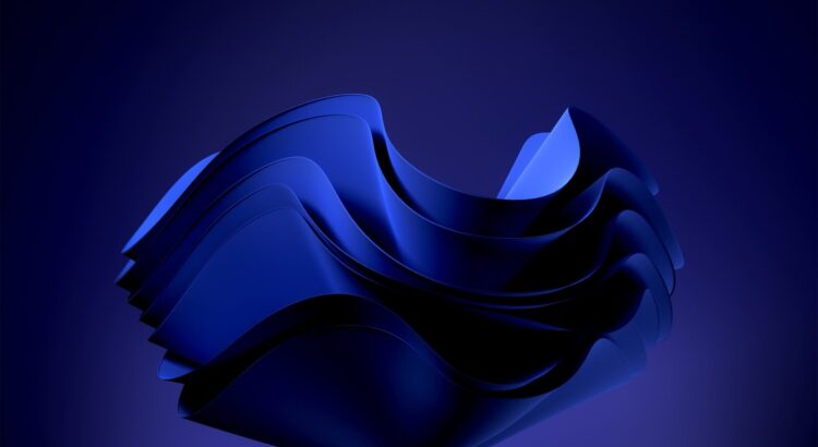 an abstract blue background with wavy shapes windows 11